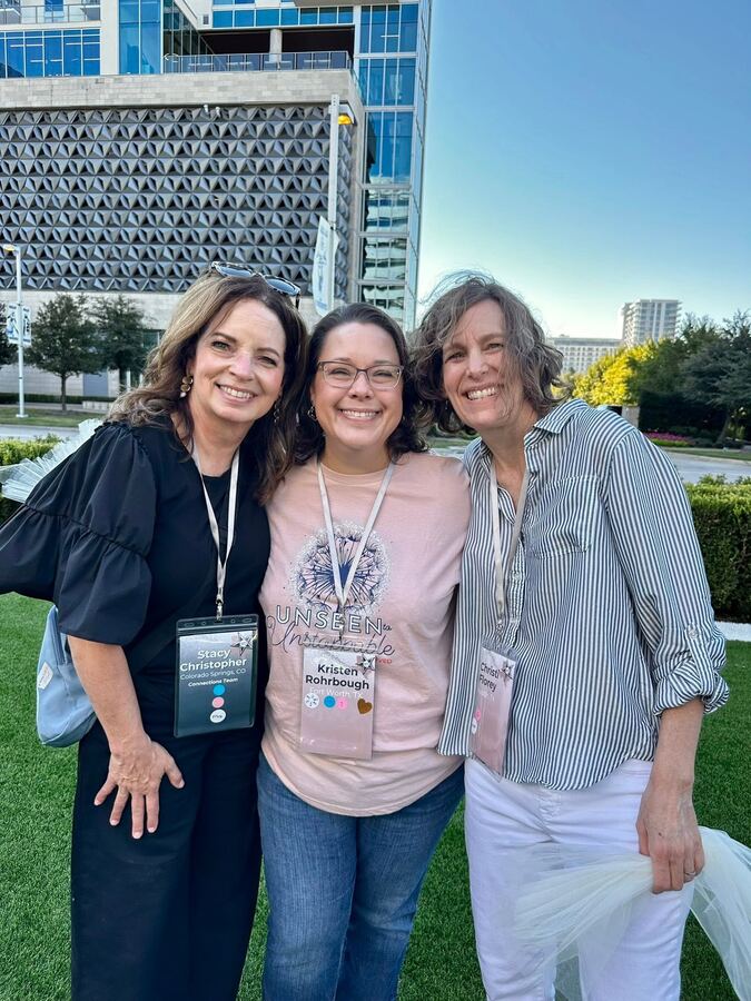 Stacy Christopher with fellow volunteers at a Labeled & Loved retreat